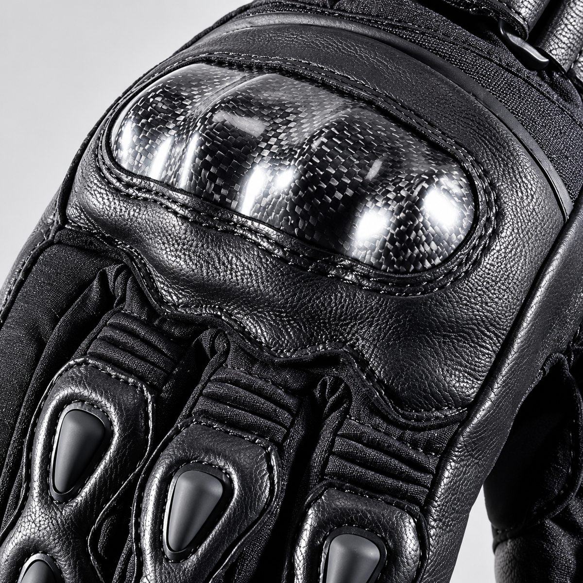 Close-up of the NeryLux DS-2310 knuckle shell, stitched panels and articulated finger guards.