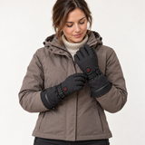 Woman naturally adjusting the wrist of her black Jinlida JLD-S1 heated gloves, wearing a taupe jacket against a light background.